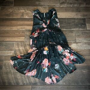 Free People pink flowers black background tiers and ruffles Tunic top M